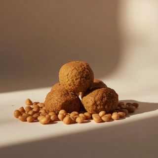 What does falafel look like? Falafel composed of chickpeas, beans, and lentils