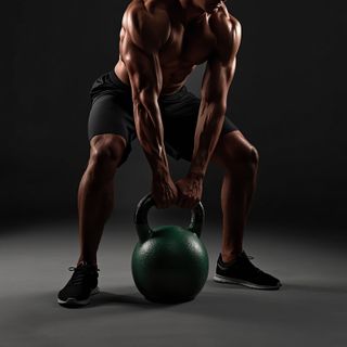 Alternating Kettlebell Wyciskanie
