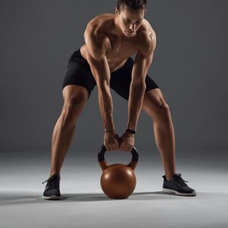 Alternating Kettlebell Press