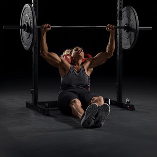 Barbell Curls Lying Against An Incline