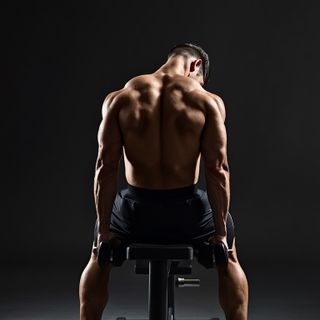 Bent Over Dumbbell Rear Delt Raise With Head On Bench