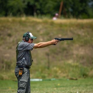 Pistol Shooting or Trap Shooting, Standing