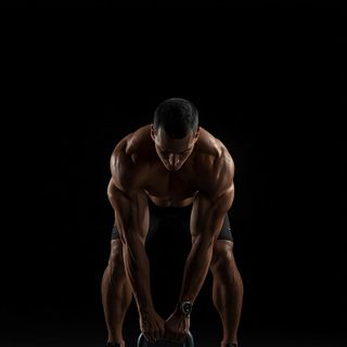 Extended Range One-Arm Kettlebell Floor Press