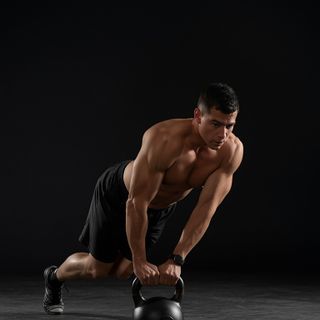 Extended Range One-Arm Kettlebell Floor Press