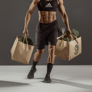 Putting away groceries (e.g. carrying groceries, shopping without a grocery cart), carrying packages