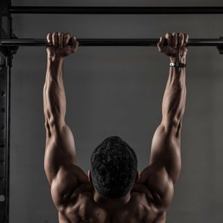 Lying Close-Grip Bar Curl On High Pulley