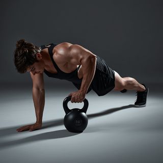 One-Arm Kettlebell Floor Press