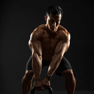One-Arm Kettlebell Split Snatch