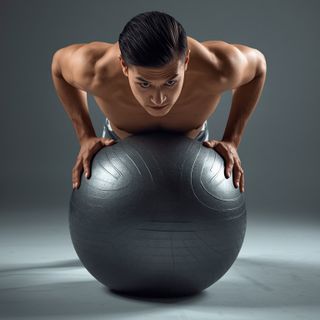 Push-Ups With Feet On An Exercise Ball