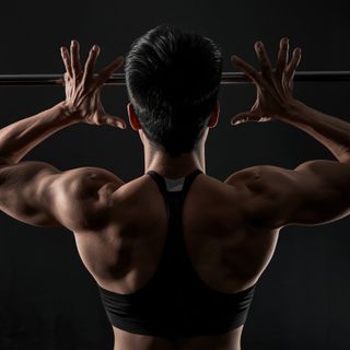 Standing Barbell Press Behind Neck