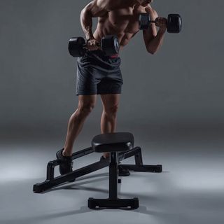 Standing One-Arm Dumbbell Curl Over Incline Bench