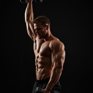 Standing Palm-In One-Arm Dumbbell Press