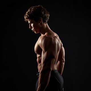 Standing Palm-In One-Arm Dumbbell Press