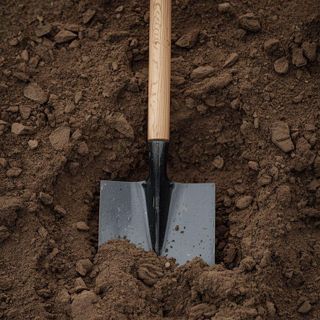 Spreading Dirt with a Shovel