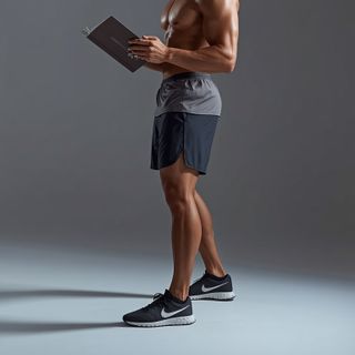 Standing, reading