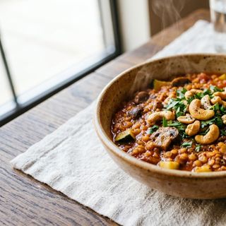 Aromatic DASH Red Lentil, Zucchini and Mushroom Stew with Crunchy Cashews