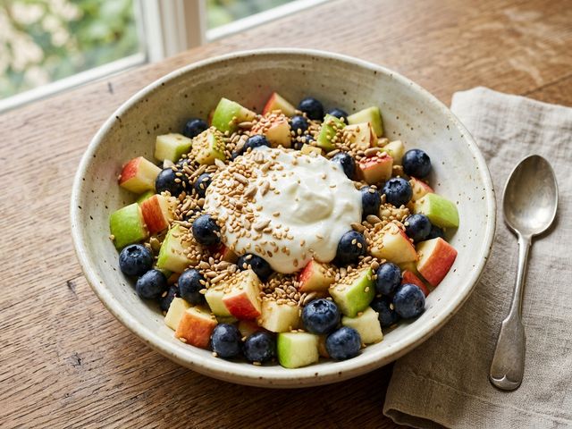 Refreshing DASH Fruit Salad with Crisp Apple, Blueberries, Natural Yogurt, and Toasted Sesame & Sunflower Seeds