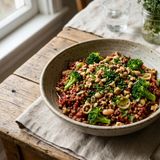 Tomato-Infused DASH Buckwheat Groats with Broccoli Florets, White Beans, Leek, Walnuts, and Chives